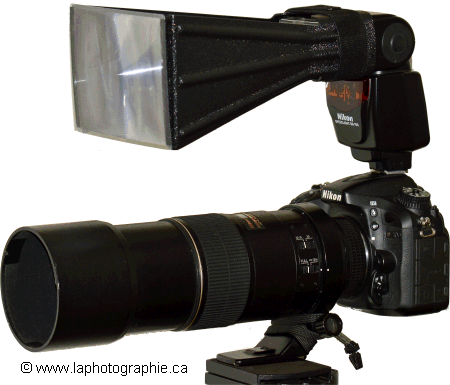 Appareil avec t�l�photo sur un tr�pied